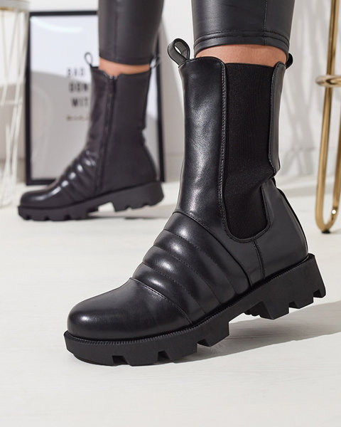 Black women's boots on a thicker sole and embossing Ferita- Footwear
