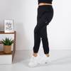 Black women's cargo pants with pockets - Trousers