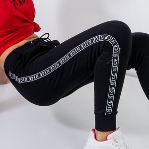 Black women's sweatpants with silver lettering - Clothing