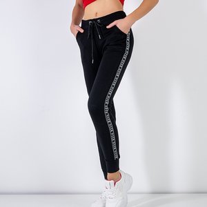Black women's sweatpants with silver lettering - Clothing