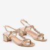 Golden sandals on a low post with cubic zirconia Doremia - Footwear