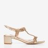 Golden sandals on a low post with cubic zirconia Doremia - Footwear