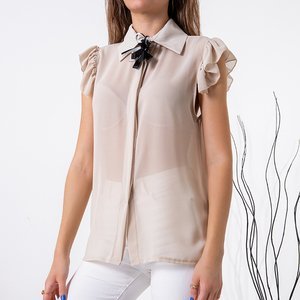 Ladies' beige blouse with a brooch - Clothing