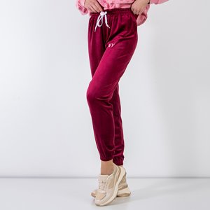 Maroon women's sweatpants with embroidered inscription - Clothing